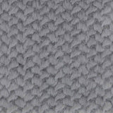 Eine Stoffprobe von der Manufaktur für Hunde. Das Stoffmuster hat die Farbe Dots Grey