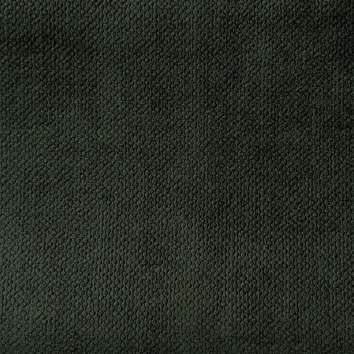 Eine Stoffprobe von der Manufaktur für Hunde. Das Stoffmuster hat die Farbe Forest