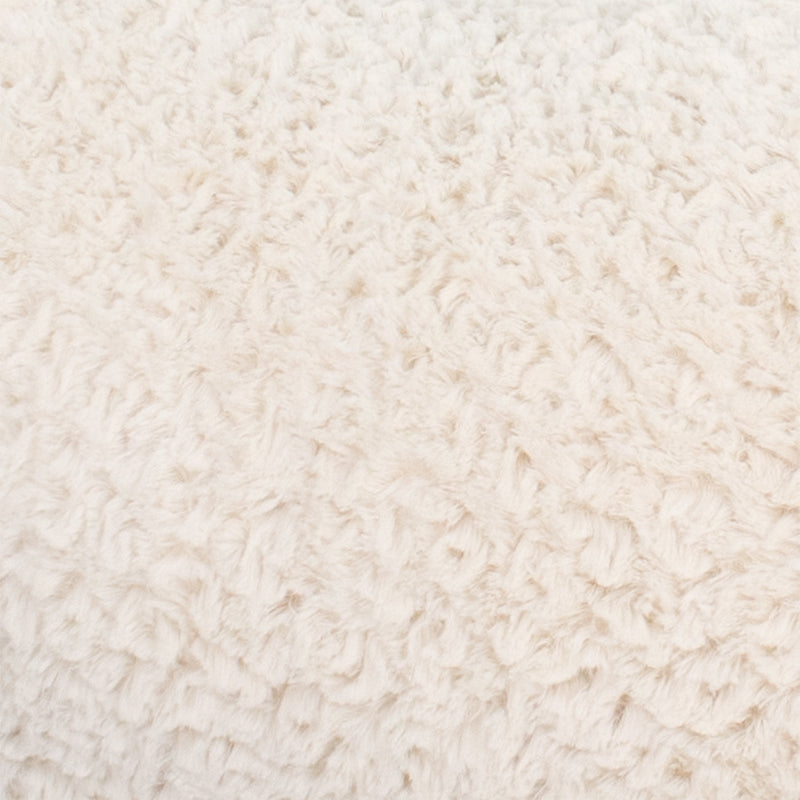 Eine Stoffprobe von der Manufaktur für Hunde. Das Stoffmuster hat die Farbe Curly White