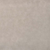 Eine Stoffprobe von der Manufaktur für Hunde. Das Stoffmuster hat die Farbe Kunstleder Grau