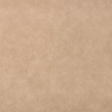 Eine Stoffprobe von der Manufaktur für Hunde. Das Stoffmuster hat die Farbe Kunstleder Taupe